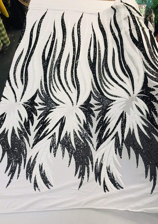 WHITE-BLACK ANGEL WINGS SEQUIN DESIGN ON A 4 WAY STRETCH MESH-BY YARD.