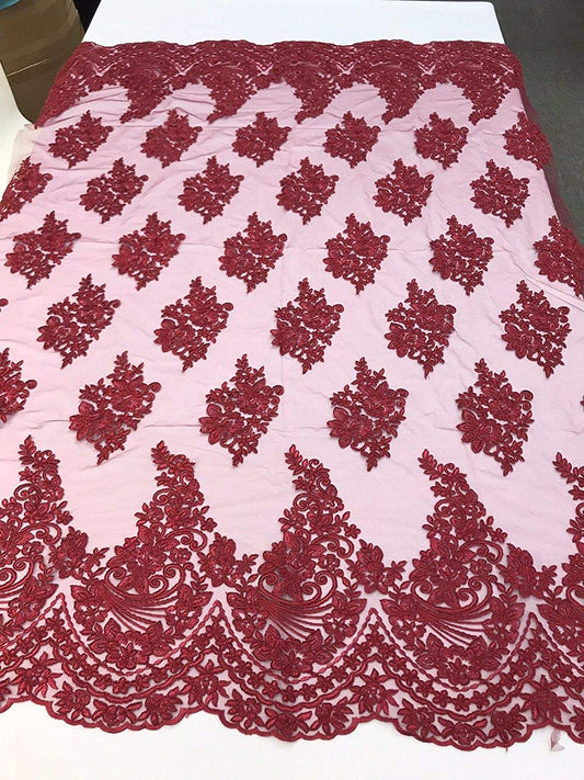 BURGUNDY DESIGN WITH CORD EMBROIDERY ON A MESH LACE-SOLD BY YARD.