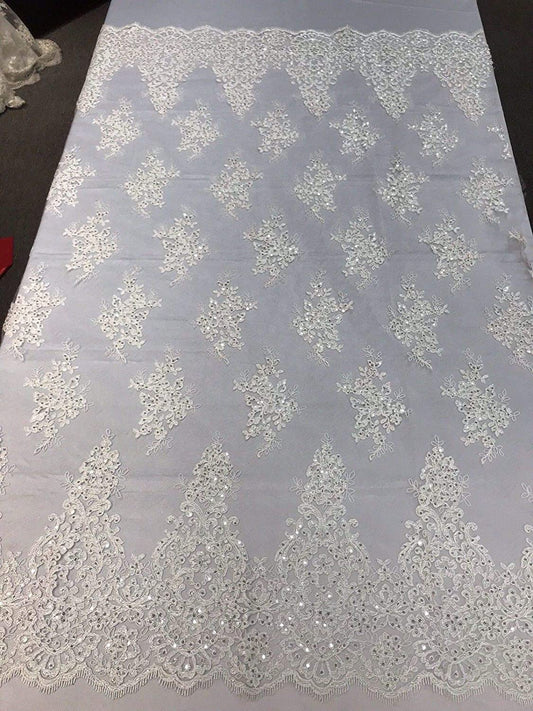 IVORY DAMASK LACE EMBROIDERY ON A TEXTURE MESH-BY YARD.