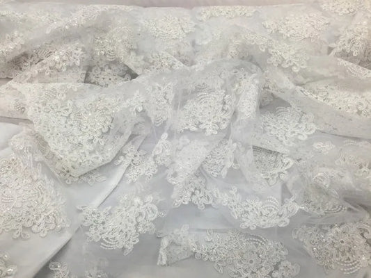 White flower lace corded and embroider with sequins on a mesh. Wedding/bridal/prom/nightgown fabric sold by the yard