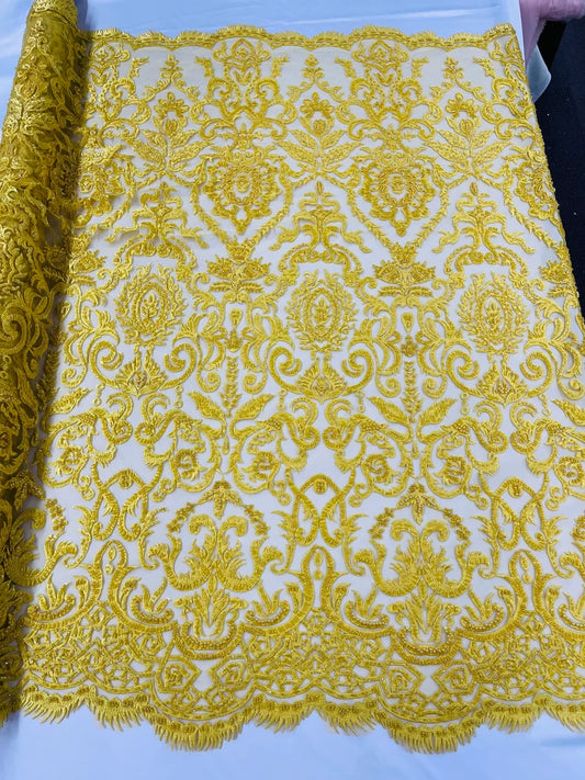 Yellow floral damask embroider and heavy beaded on a mesh lace fabric-sold by the yard-