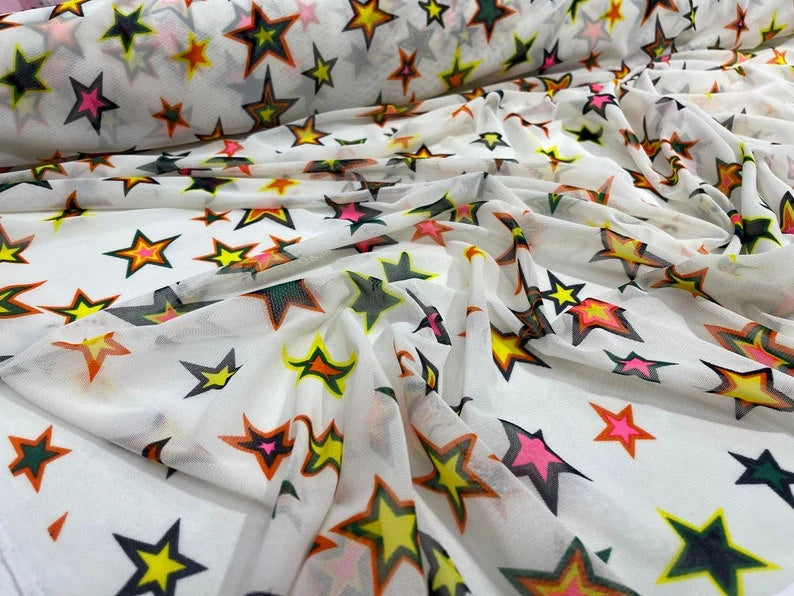 Star Design on a Ivory Power Mesh 4-way stretch 58"-Sold by the Yard