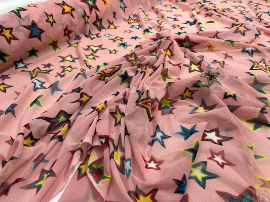 Star Design on a Dusty Pink Power Mesh 4-way stretch 58"-Sold by the Yard