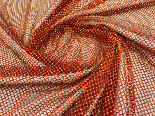 Iridescent Rhinestones On Soft Stretch Fish Net Fabric 45" Wide -sold by The Yard. Orange