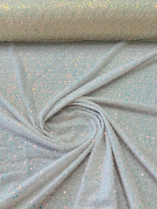 Royalty Fabrics White iridescent heavy hand beaded princess design embroider with beads-pearls-sequins on a mesh lace-sold by yard.