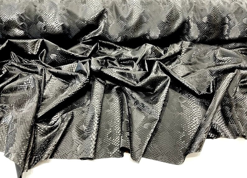 Illusion snake skin print on a stretch spandex-skirts-leggings-dresses-sold by the yard. Black