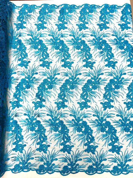 Feather design lace with metallic cord and embroider with sequins on a mesh-Sold by the yard. Teal Blue