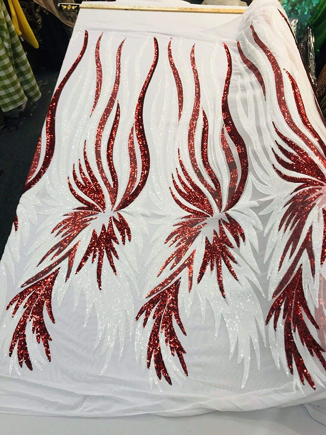 RED-WHITE ANGEL WINGS SEQUIN DESIGN ON A 4 WAY STRETCH MESH-BY YARD.