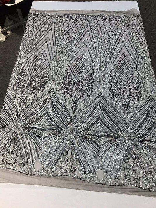 GRAY SEQUIN DIAMOND DESIGN EMBROIDERY ON A 4 WAY STRETCH MESH-SOLD BY YARD.