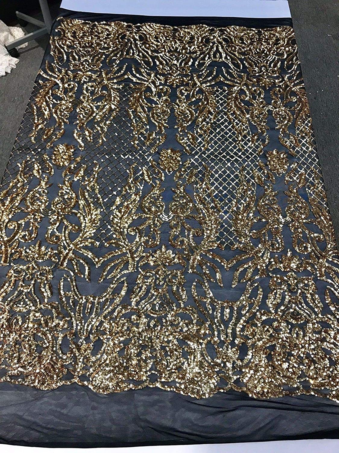 GOLD SHINY SEQUIN DAMASK DESIGN EMBROIDERY ON A BLACK 4 WAY STRETCH MESH-1 YARD.