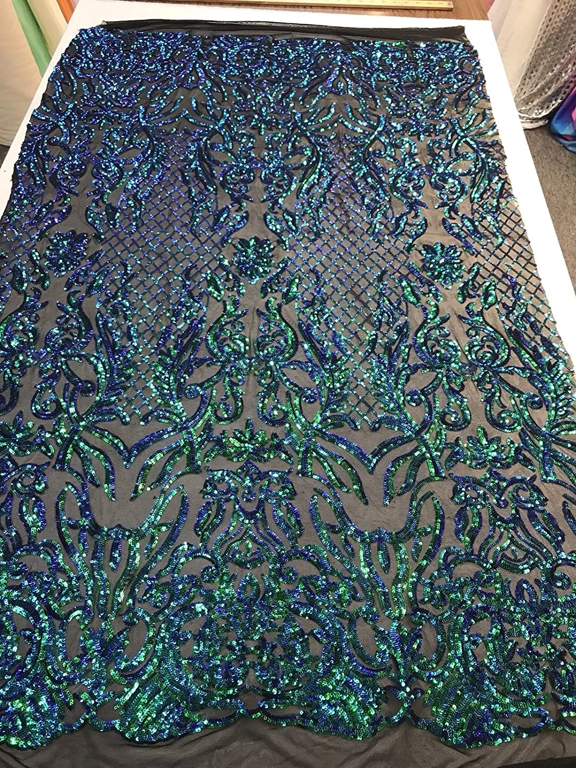IRIDESCENT GREEN SEQUINDAMASK DESIGN EMBROIDERY ON A 4 WAY STRETCH MESH-BY YARD