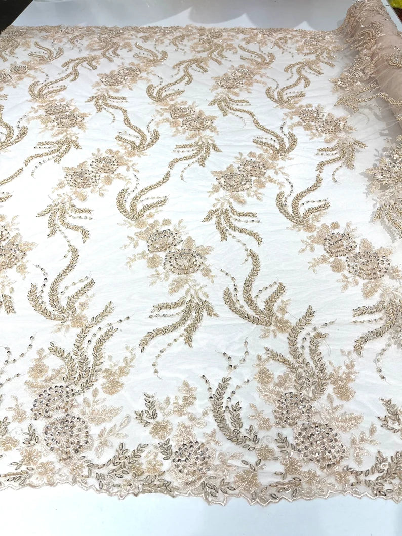 Blush Peach flowers embroider and heavy beaded on a mesh lace fabric-sold by the yard.