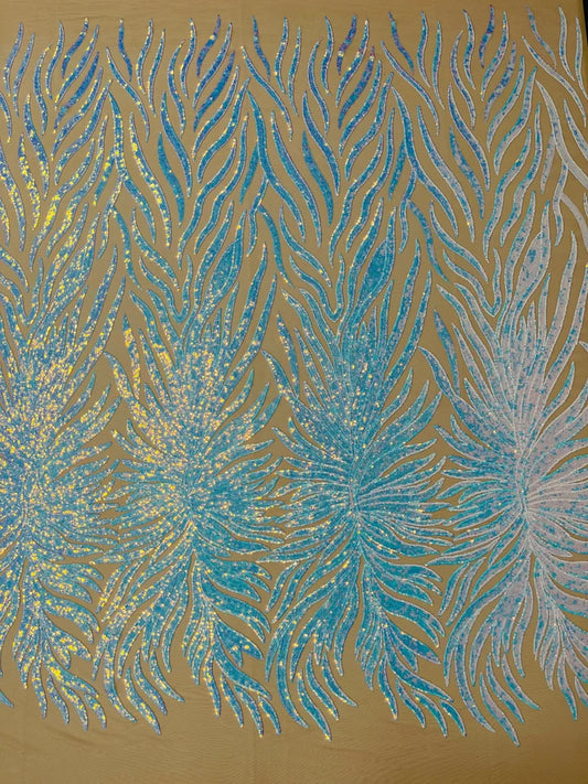 Aqua iridescent phoenix feather design with sequins embroider on a Nude 4 way stretch mesh fabric-sold by the yard.