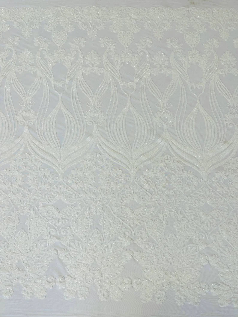 New White shiny sequin damask design on a 4 way stretch mesh-sold by the yard.