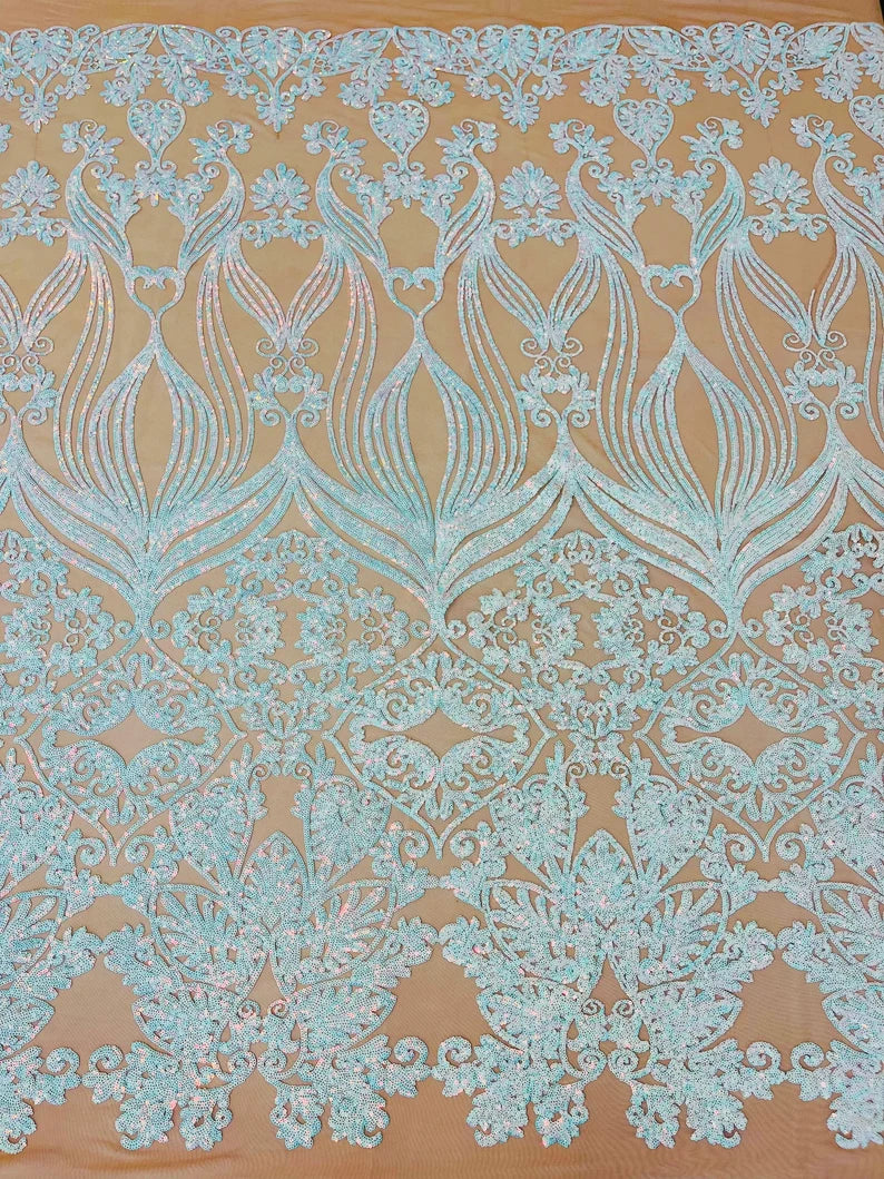 New Aqua iridescent shiny sequin damask design on a Nude 4 way stretch mesh-sold by the yard.