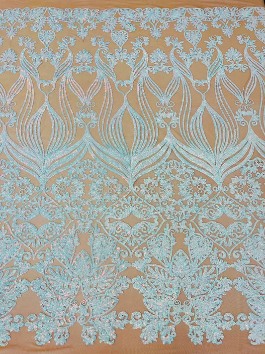 New Aqua iridescent shiny sequin damask design on a Nude 4 way stretch mesh-sold by the yard.