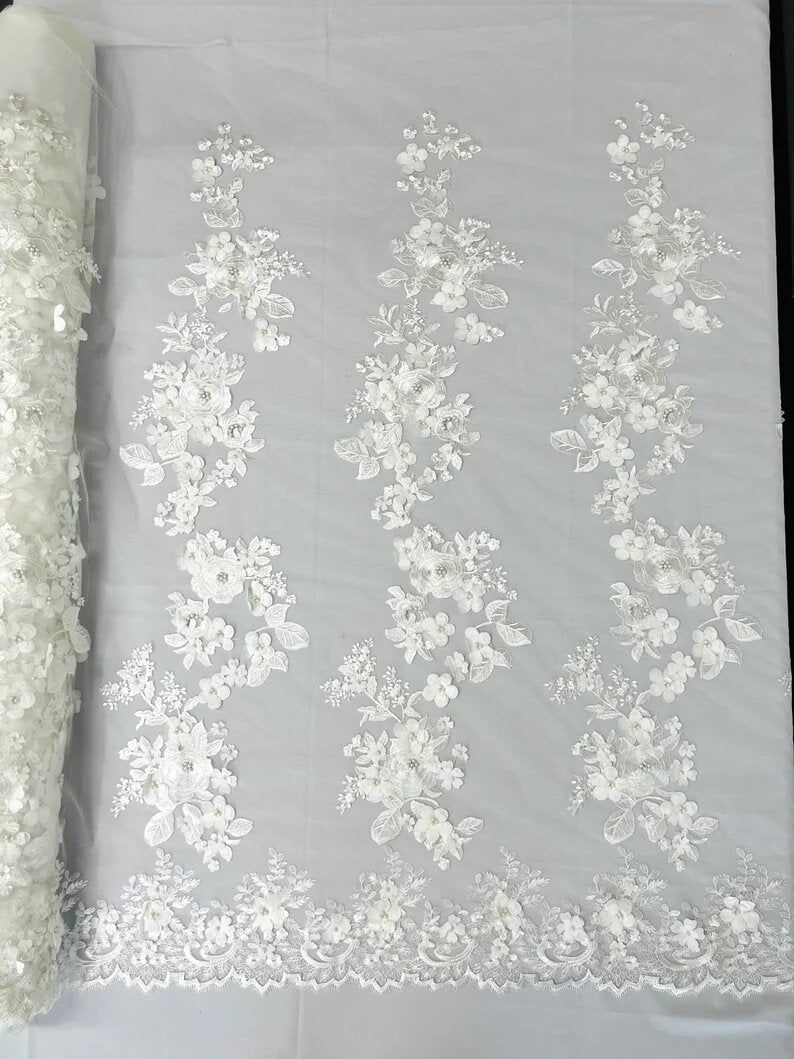 3D floral design embroider with pearls in a mesh lace-sold by the yard. Ivory