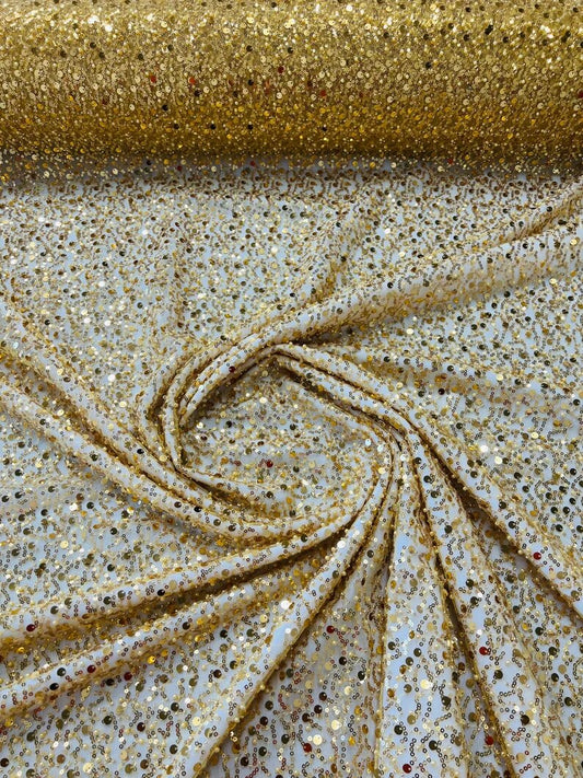 Royalty Fabrics Gold iridescent heavy hand beaded princess design embroider with beads-pearls-sequins on a mesh lace-sold by yard.