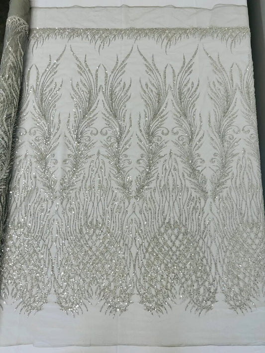 Wings Design Embroider and heavy beading on a mesh lace-sold by the yard. Silver