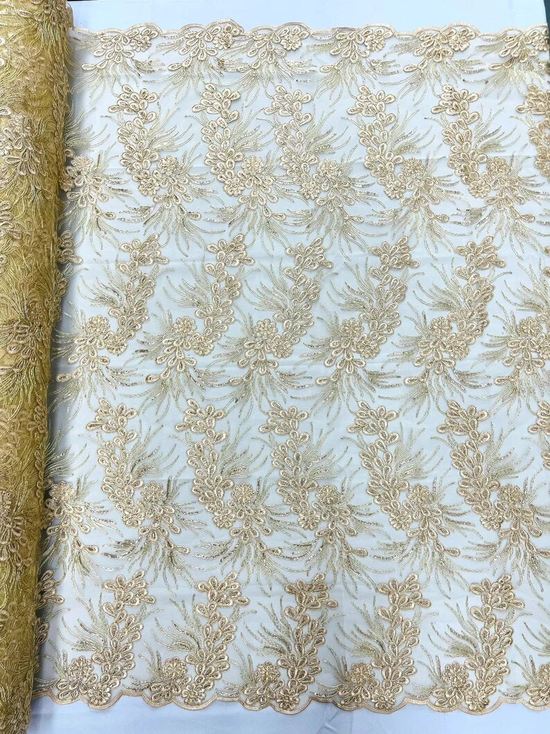 Feather design lace with metallic cord and embroider with sequins on a mesh-Sold by the yard. Beige