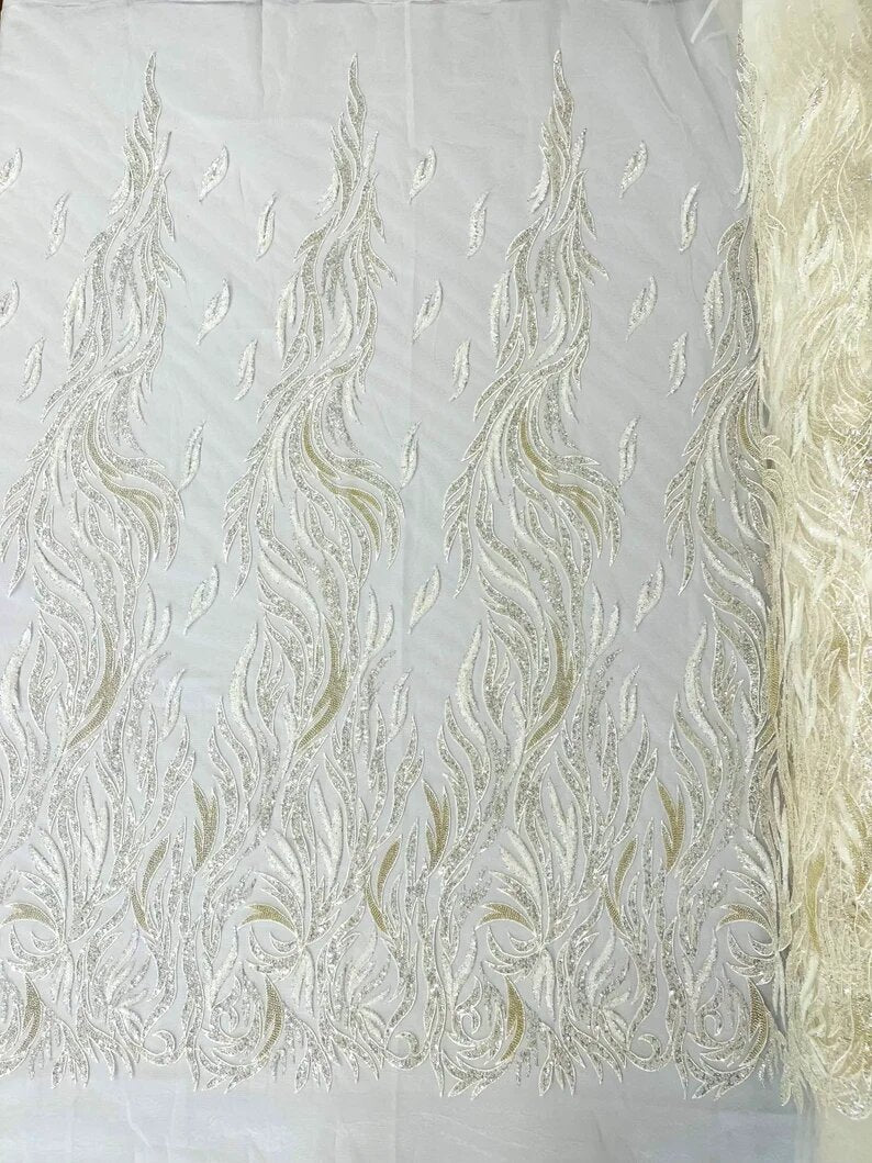Royalty Fabrics Fire/Flames hand beaded design embroider on a mesh lace-prom-sold by the yard. Ivory