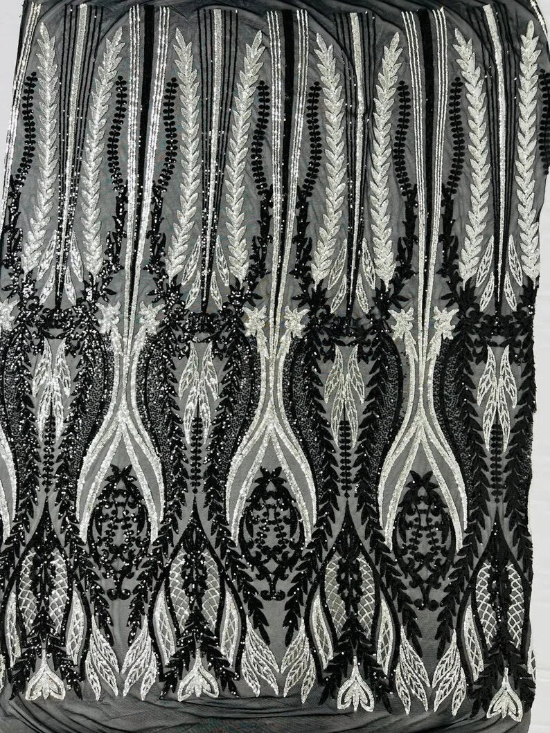 Two tone damask design with sequins embroider on a 4 way stretch mesh fabric-sold by the yard. Silver/Black